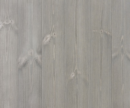 Grå träpanel med synliga ådringar och kvistmärken, liggande vertikalt.